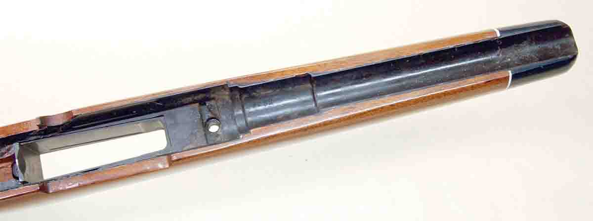Full-contact bedding of receiver and barrel channel is shown. The rifle’s owner was frustrated with the accuracy of this lightweight Mauser and used more epoxy than necessary – but it worked.